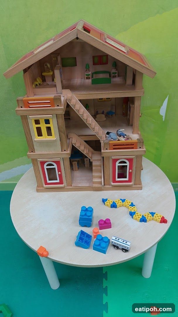 Wooden Dollhouse on Table