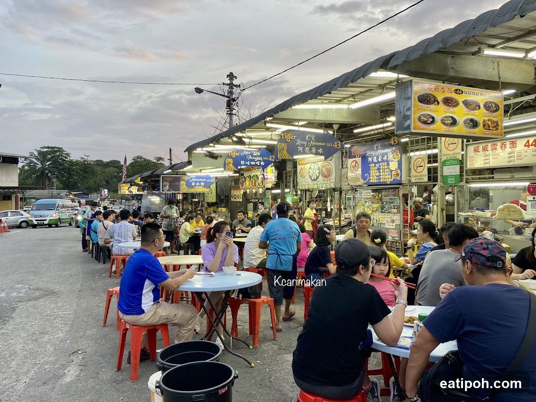 Outdoor food stall area at dusk