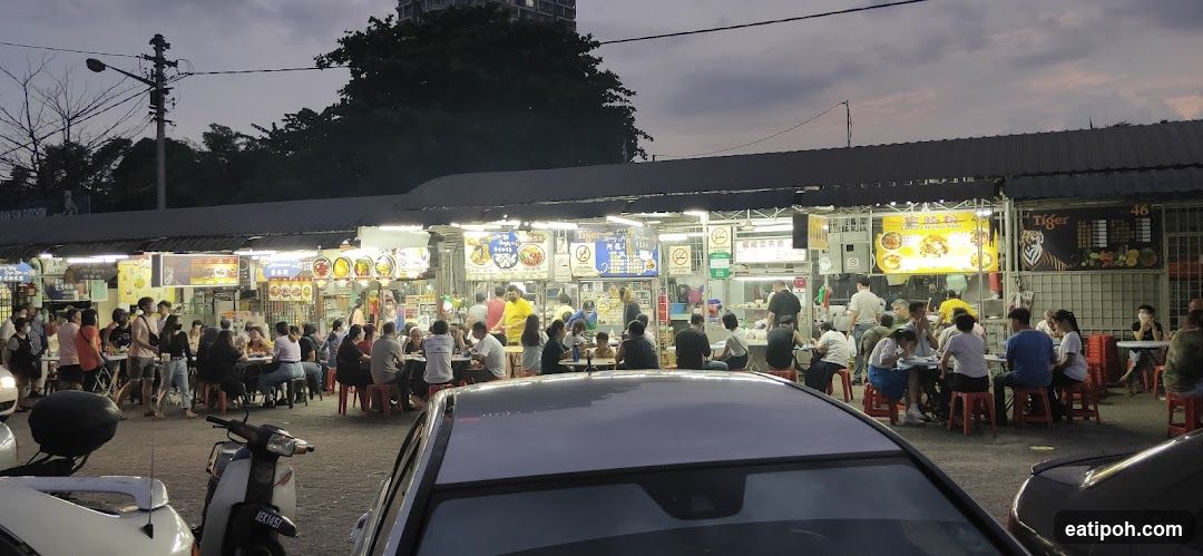 Nighttime outdoor food stall area
