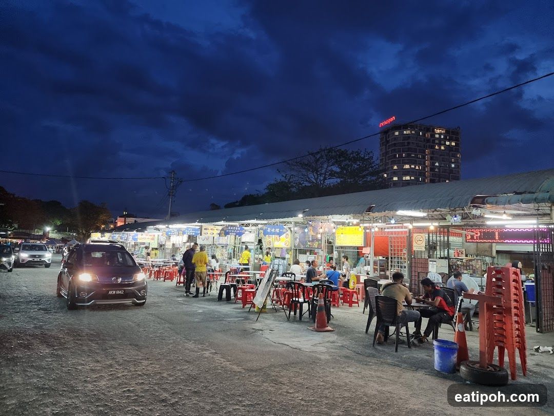 Nighttime outdoor food stall area