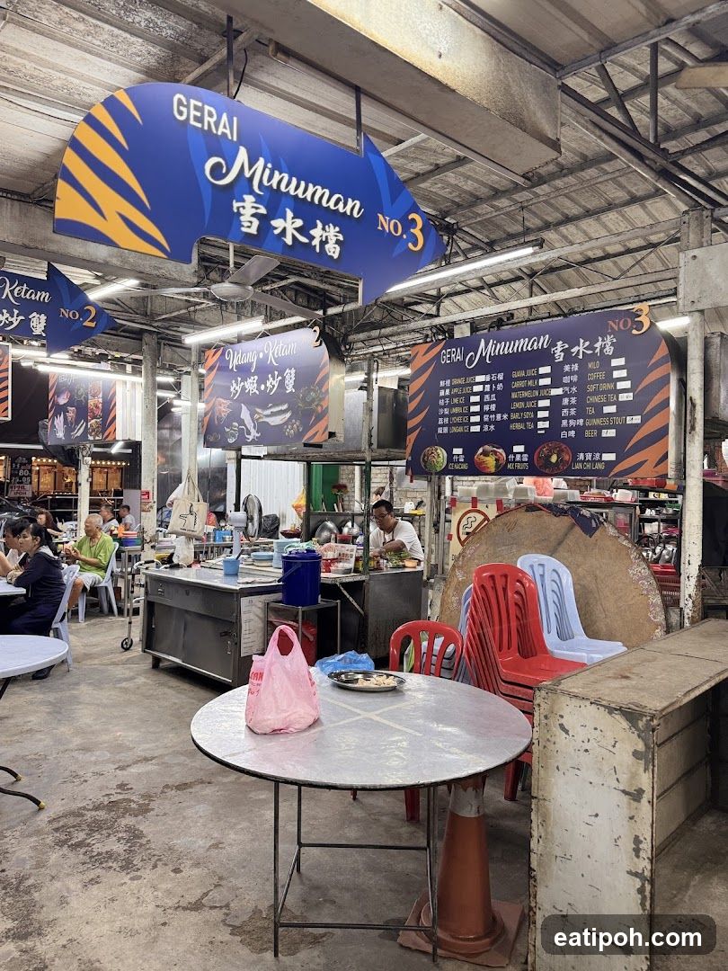 Food stall interior with beverage and fried fish vendors