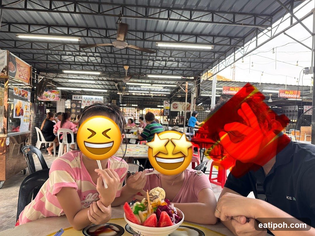 People dining at an open-air food court