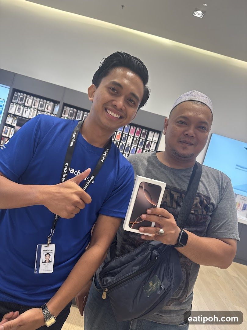 Two individuals in electronics store
