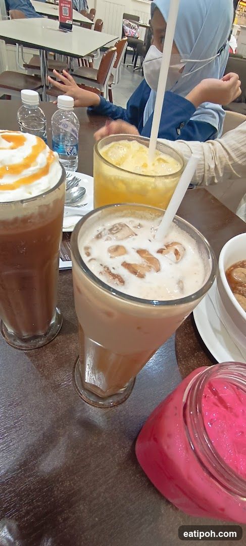 Table with beverages and customer