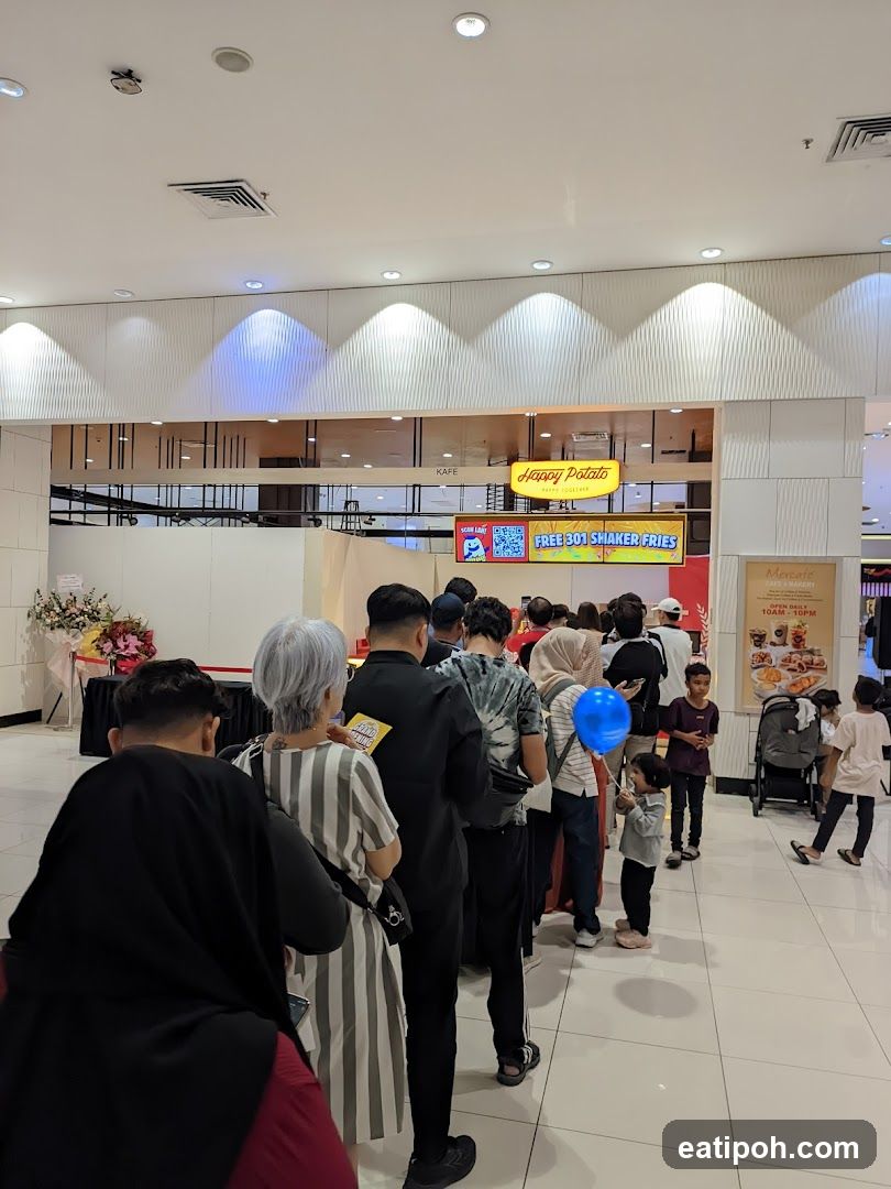 Interior of shopping mall with Happy Potato storefront
