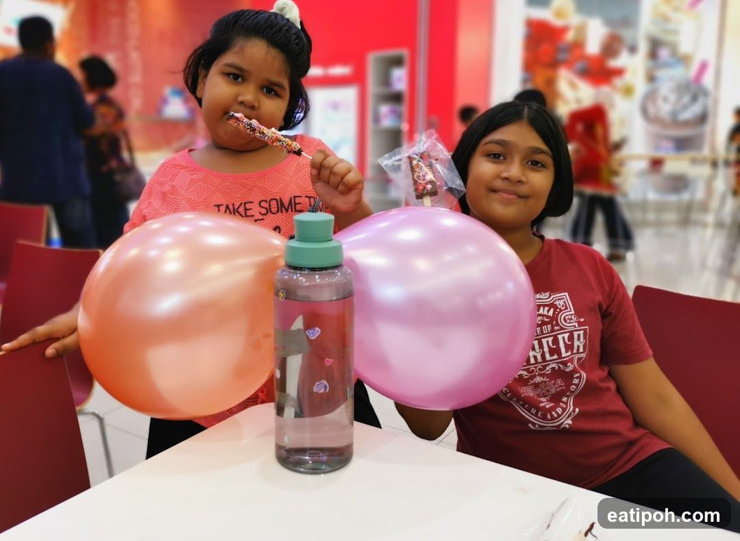 Two children at a food court