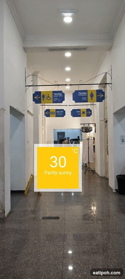 Interior hallway with directional signs