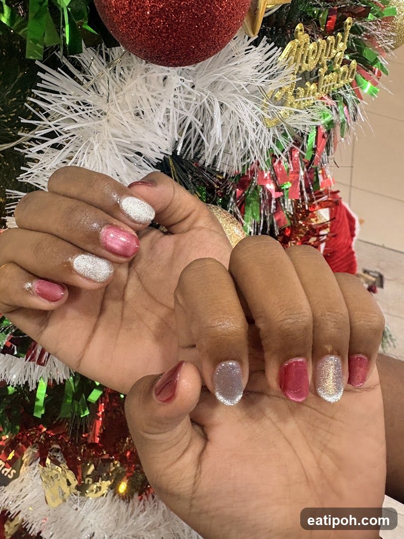 Hands with Christmas-themed nails