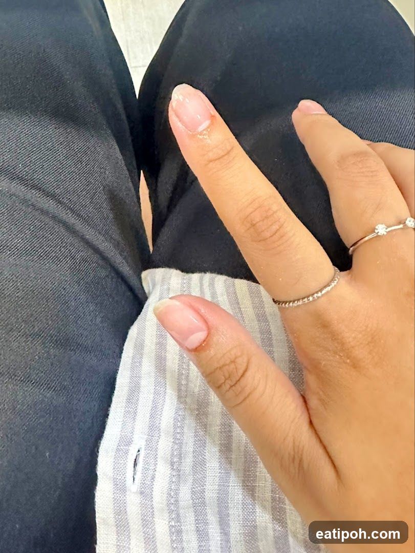 Hand with Rings and Nails