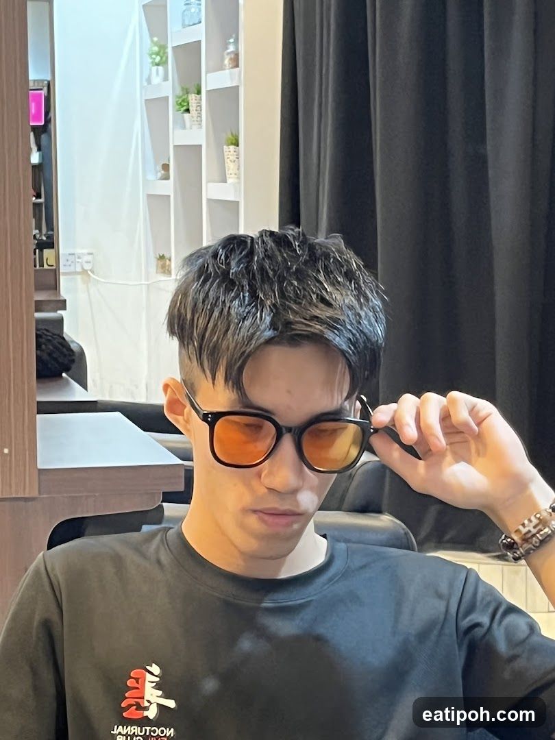 Interior shot of a person in a salon or similar setting