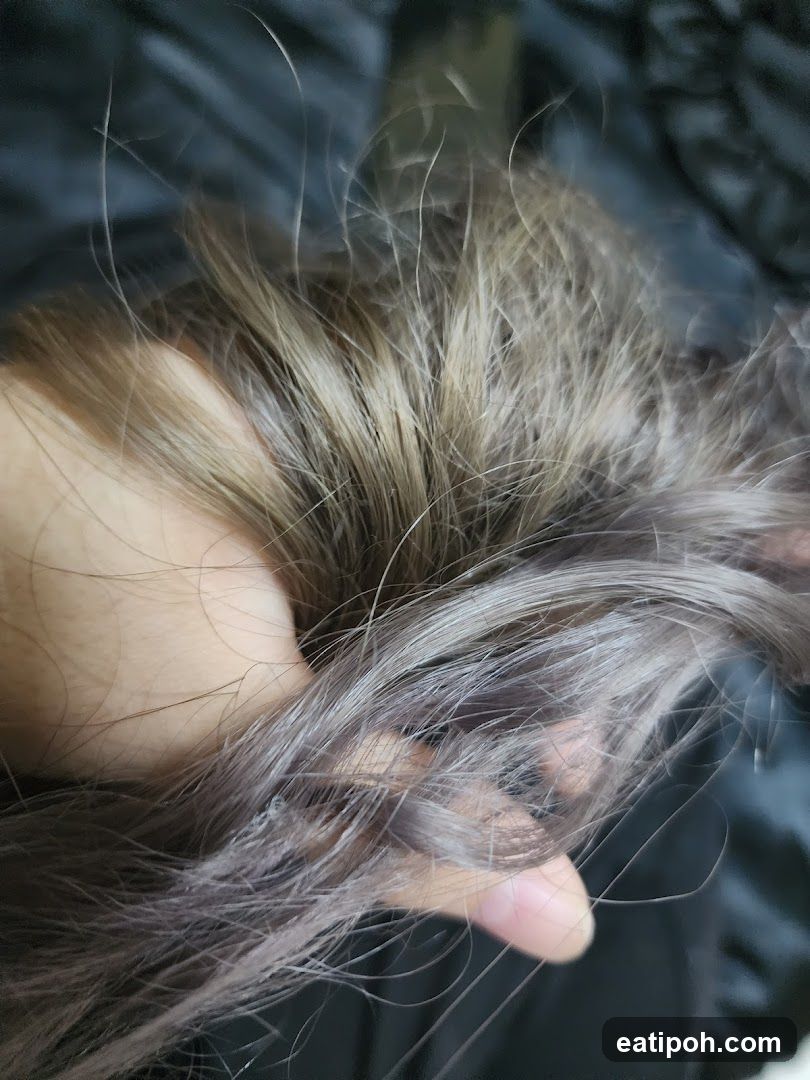 Hand Holding Hair