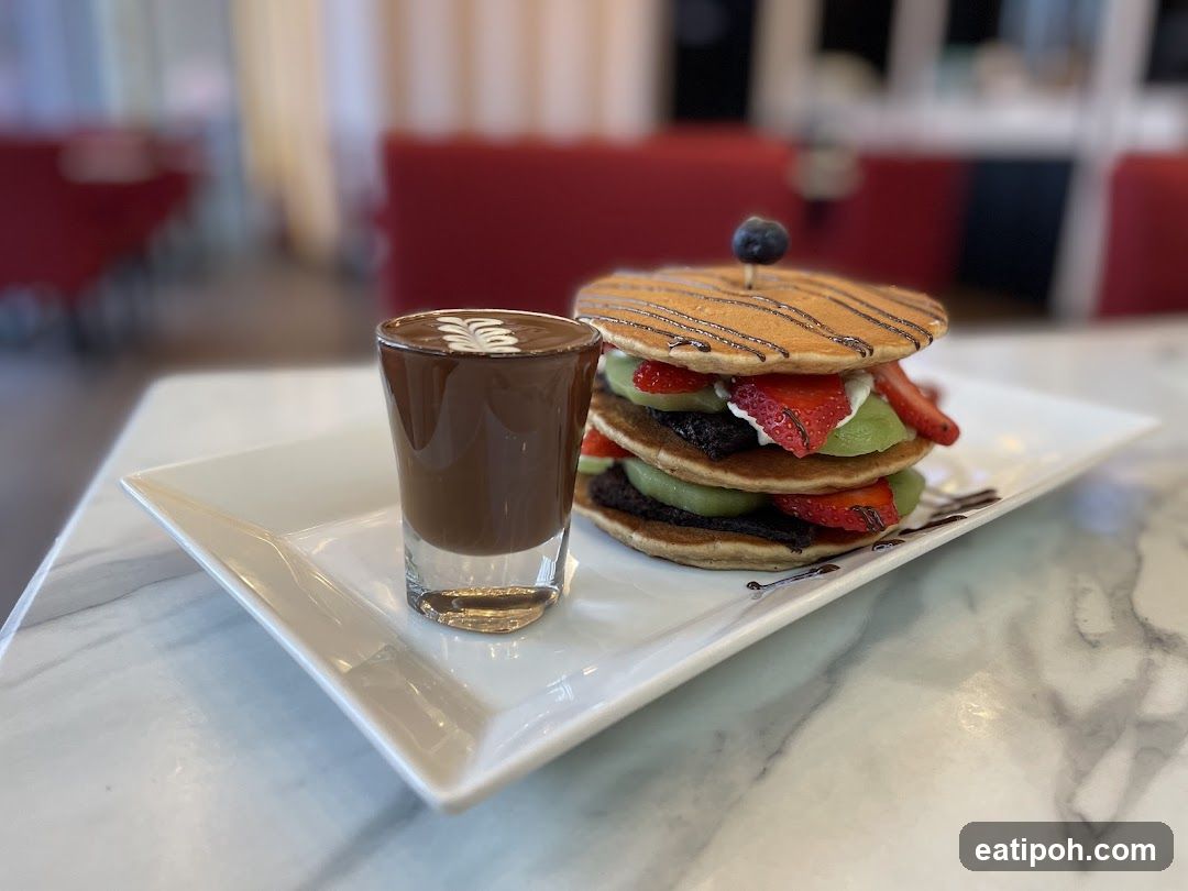 Dessert Plate with Pancake Stack and Chocolate Drink