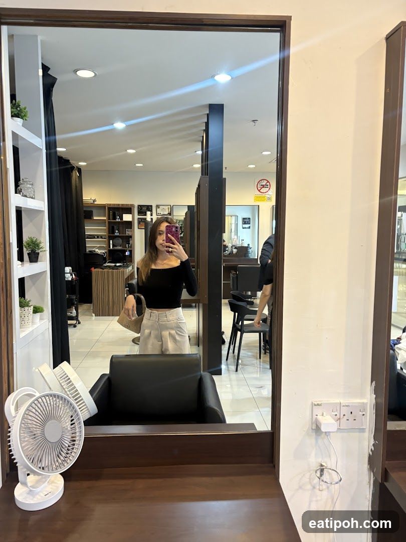 Interior mirror selfie at salon