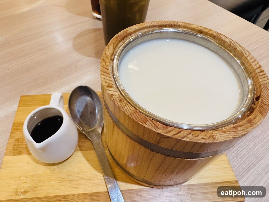 Table Setting with Wooden Pot and Small Pitcher