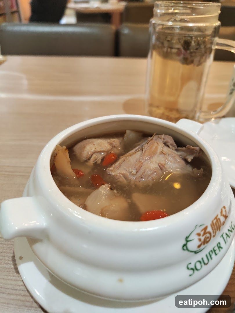 Soup in ceramic bowl with branded logo