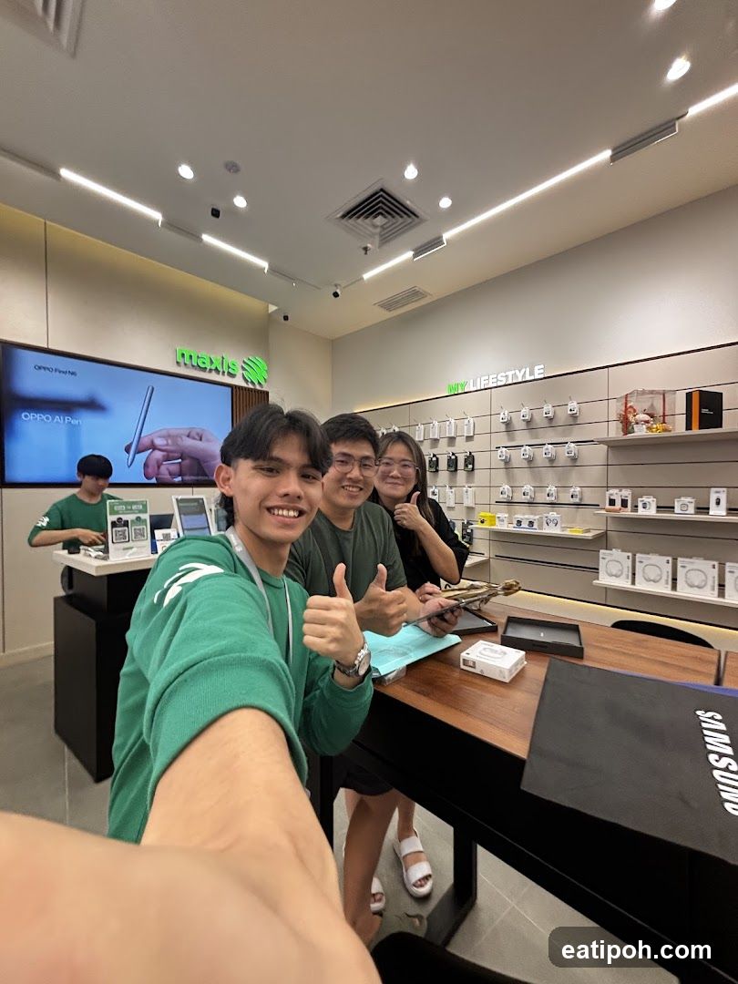 Group selfie inside electronics store