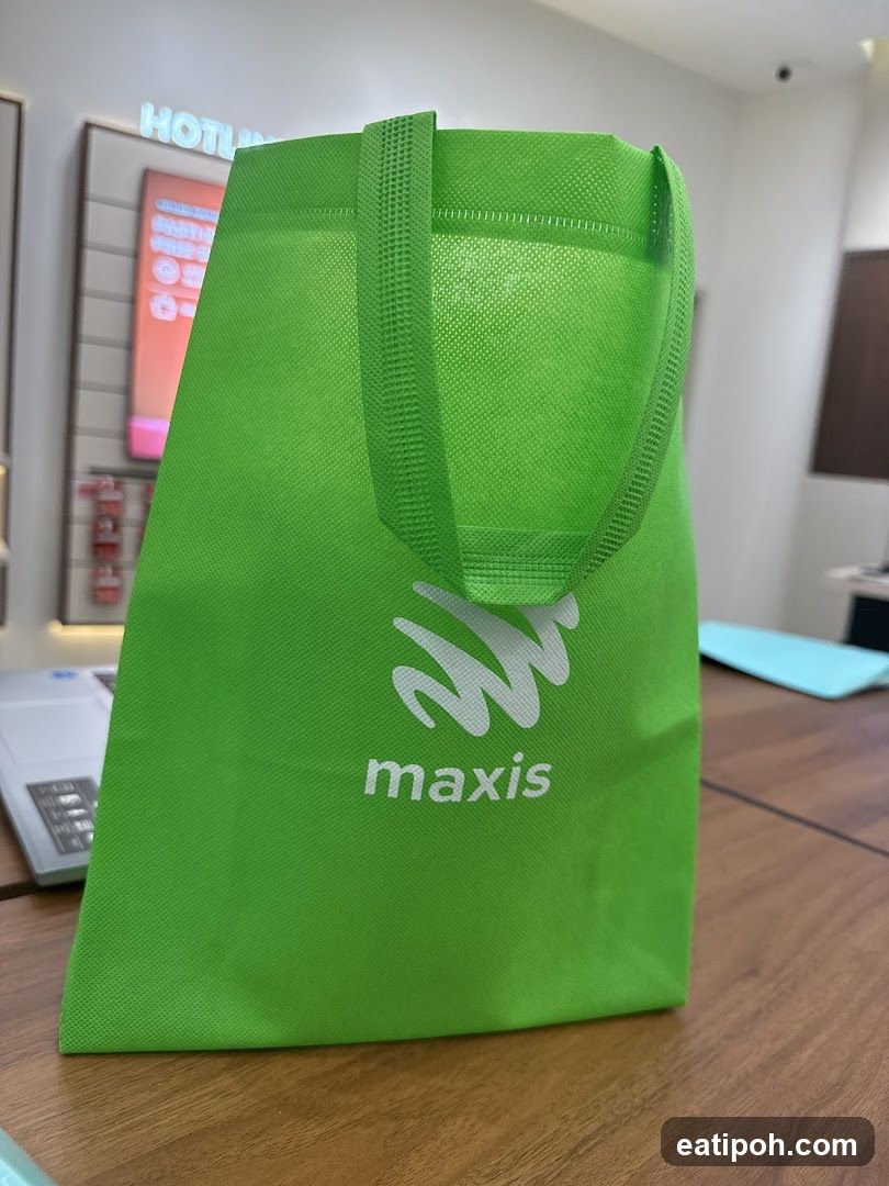 Maxis Green Bag on Table