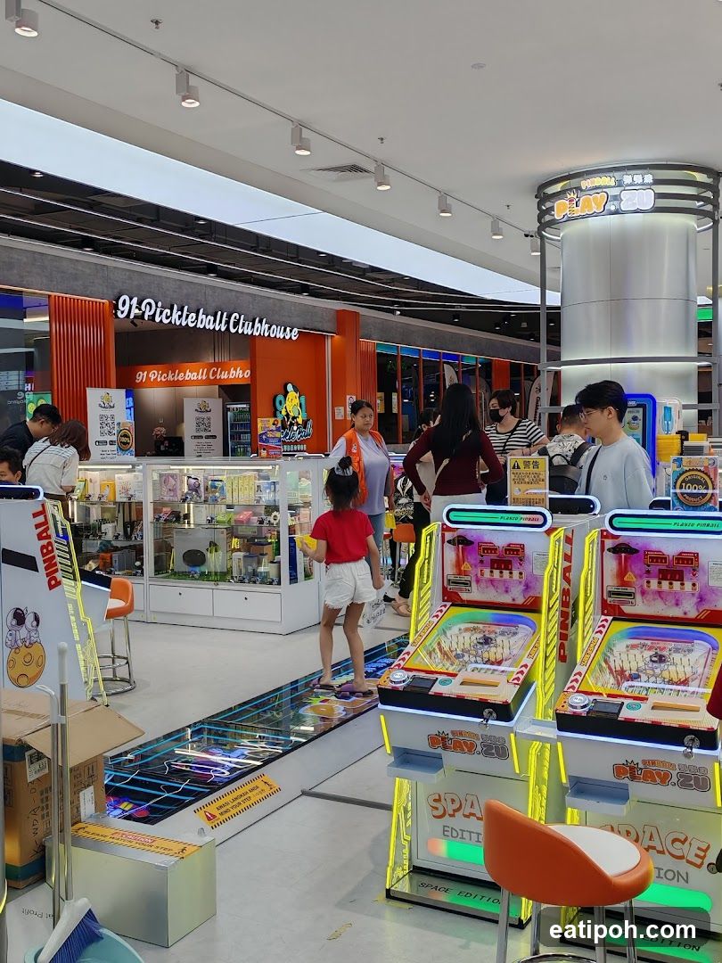Inside a shopping mall arcade area
