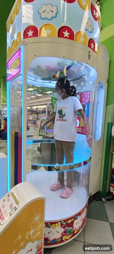 Child in arcade machine