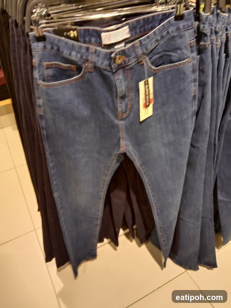 Denim pants on display rack