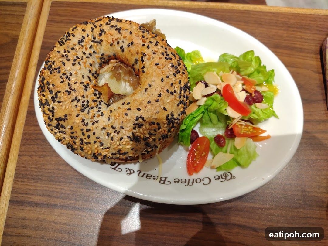 Bagel and Salad on Plate