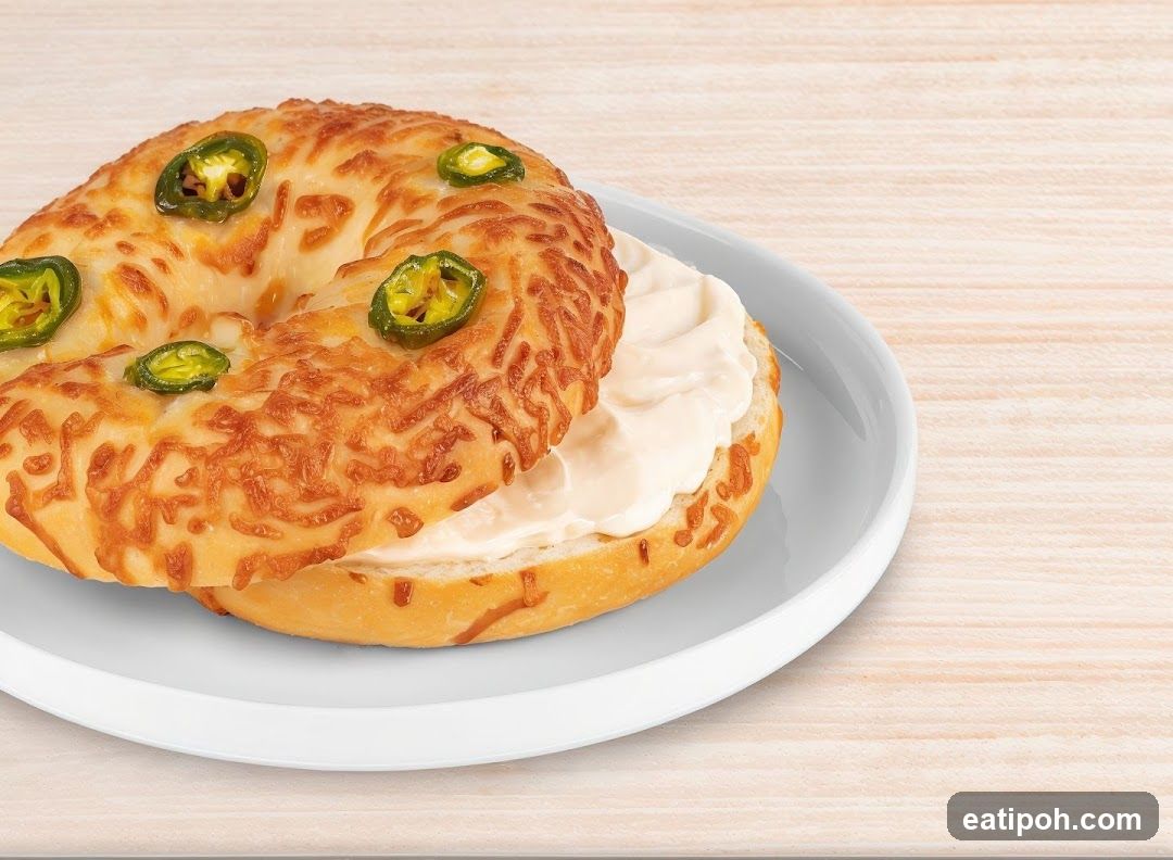 Bagel with cream cheese and jalapeños