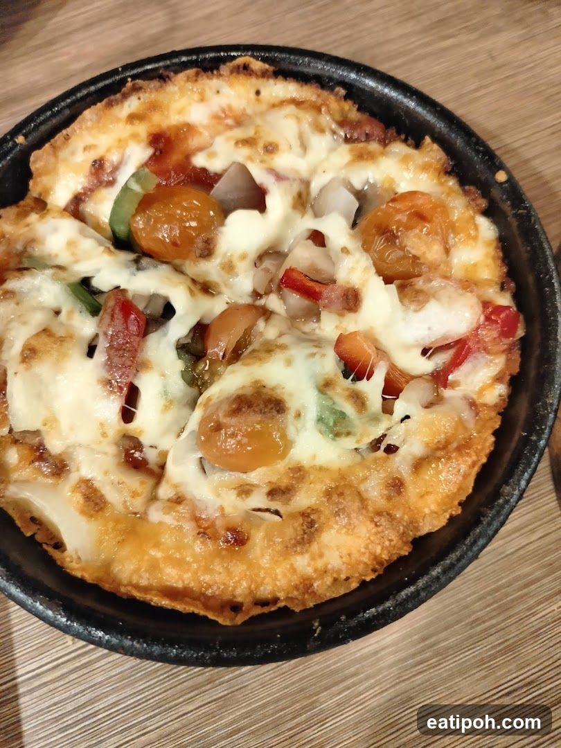 Pizza in a black pan