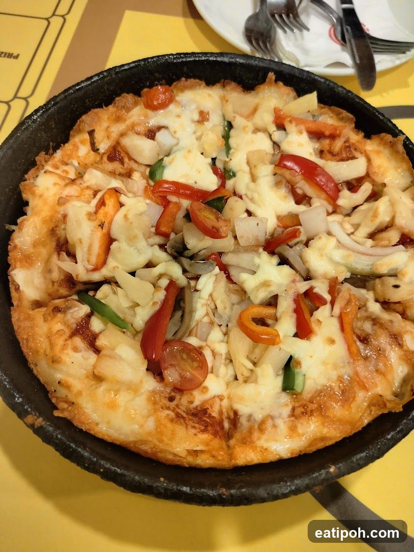 Pizza in cast iron skillet