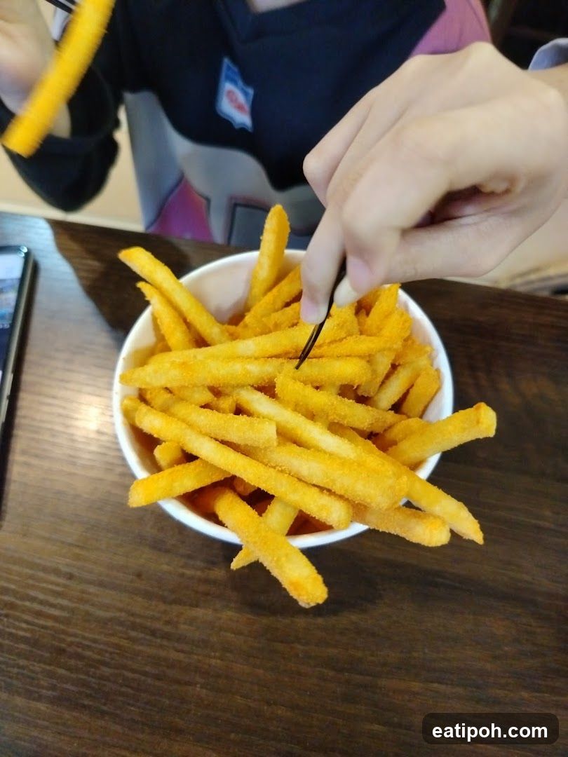 Person eating fries