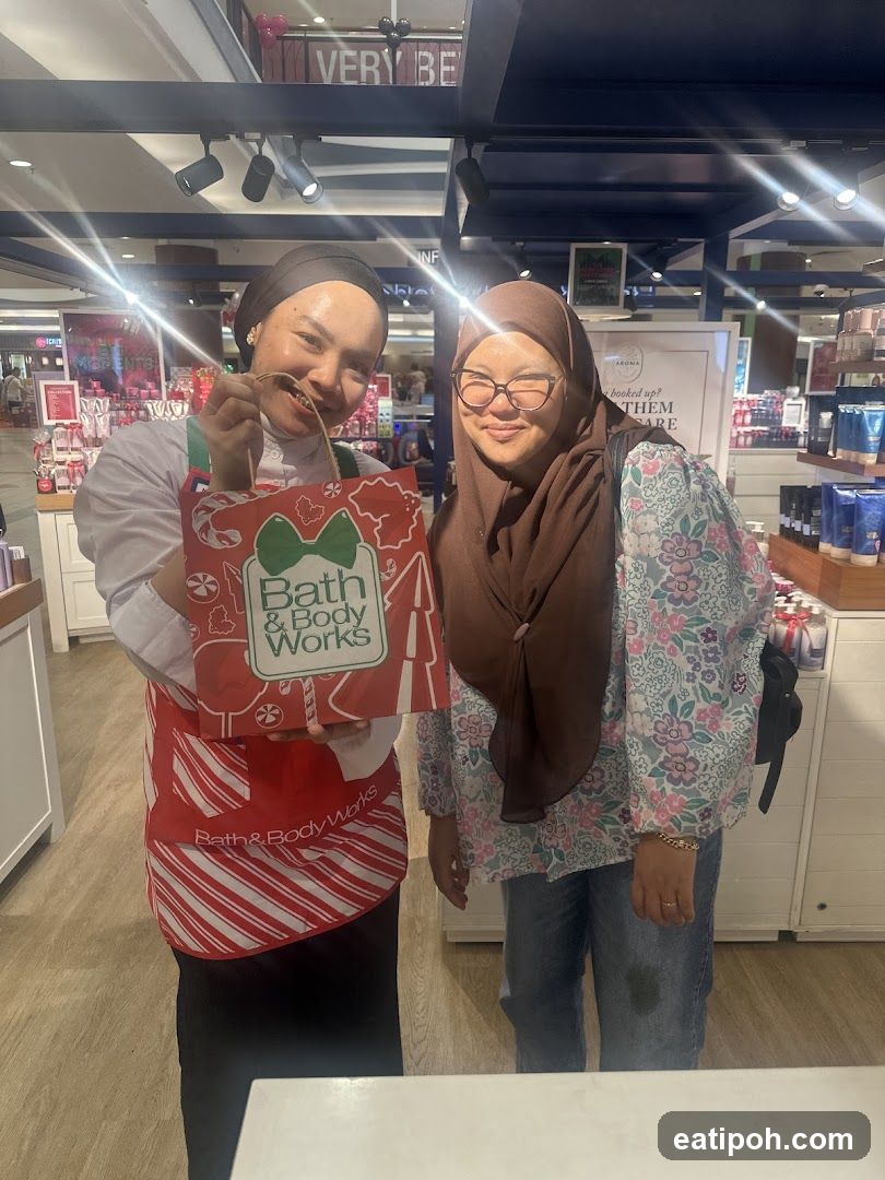 Two individuals in Bath & Body Works store
