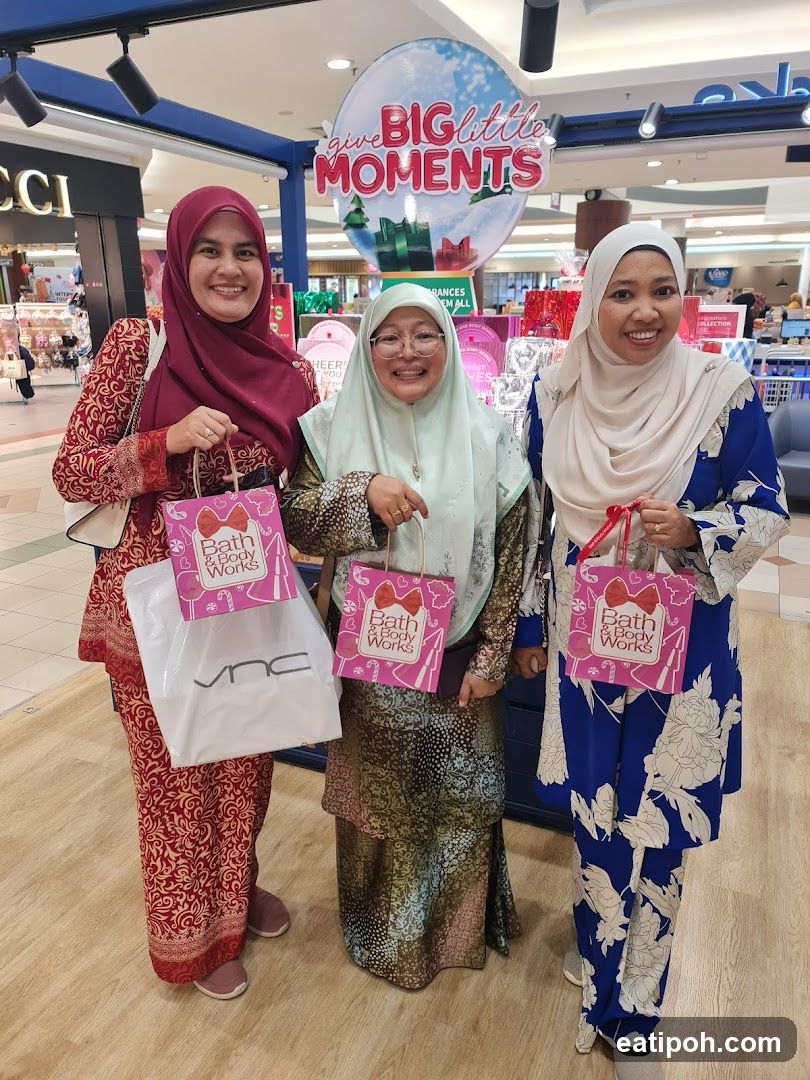 Three women shopping in a mall
