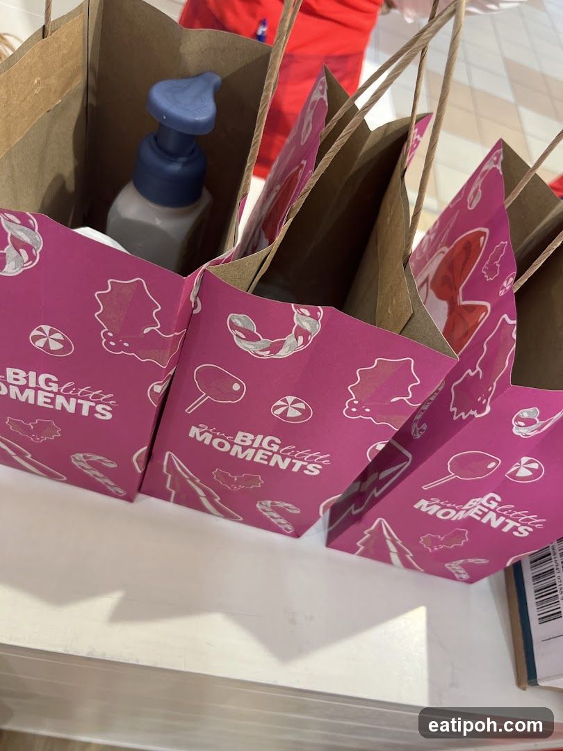 Pink Gift Bags with 'Give Big Little Moments' Design