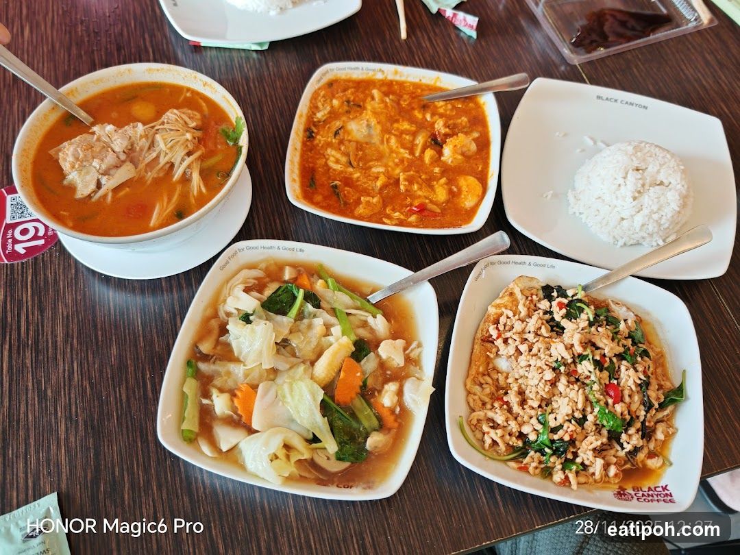 Table with Thai dishes