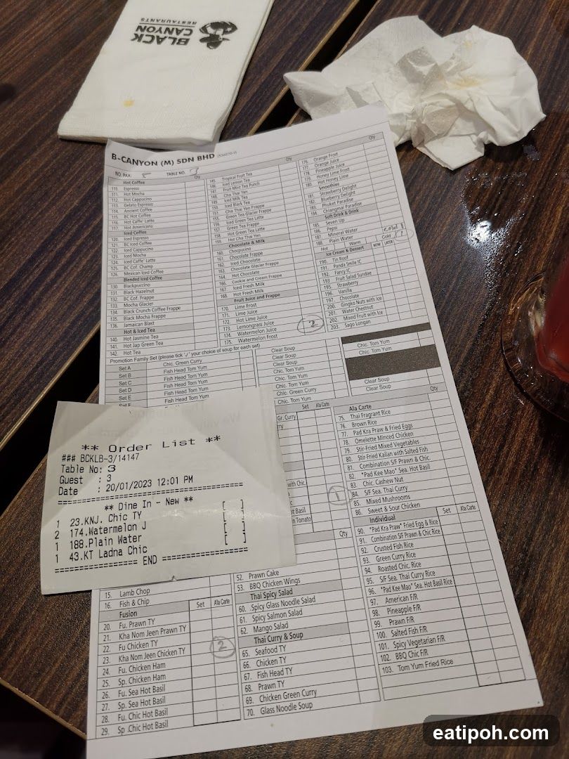 Order receipt and menu at Black Canyon restaurant