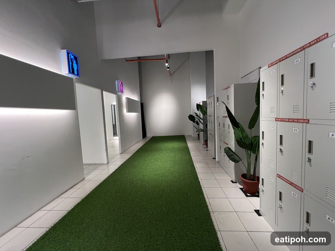 Interior hallway with lockers and artificial grass