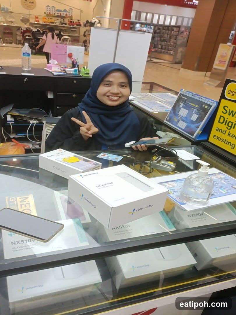 Customer at telecom store counter