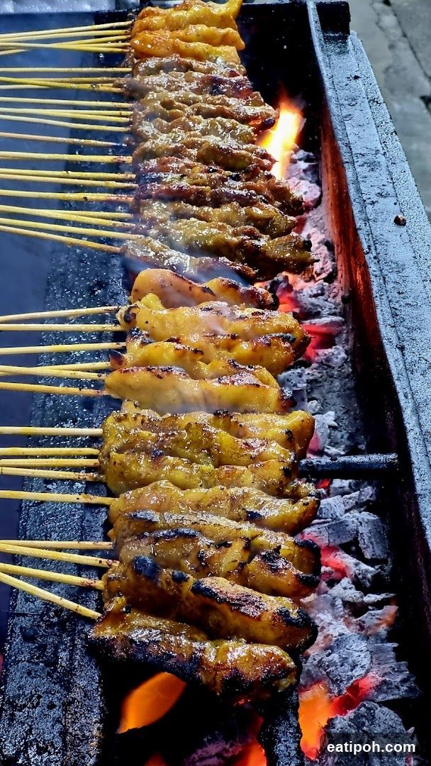 Grilled Satay Skewers on Charcoal Fire