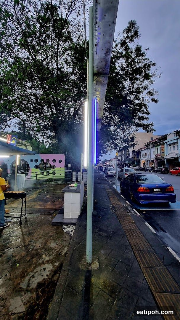 Street Scene with Vendor and Cars