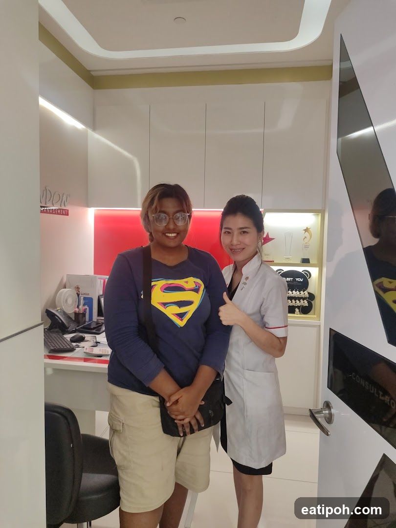 Two individuals in a clinic or office interior