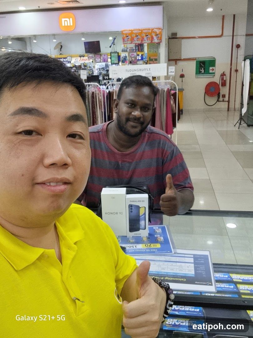 Two men in electronics store