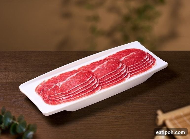 Raw Meat Slices on Plate
