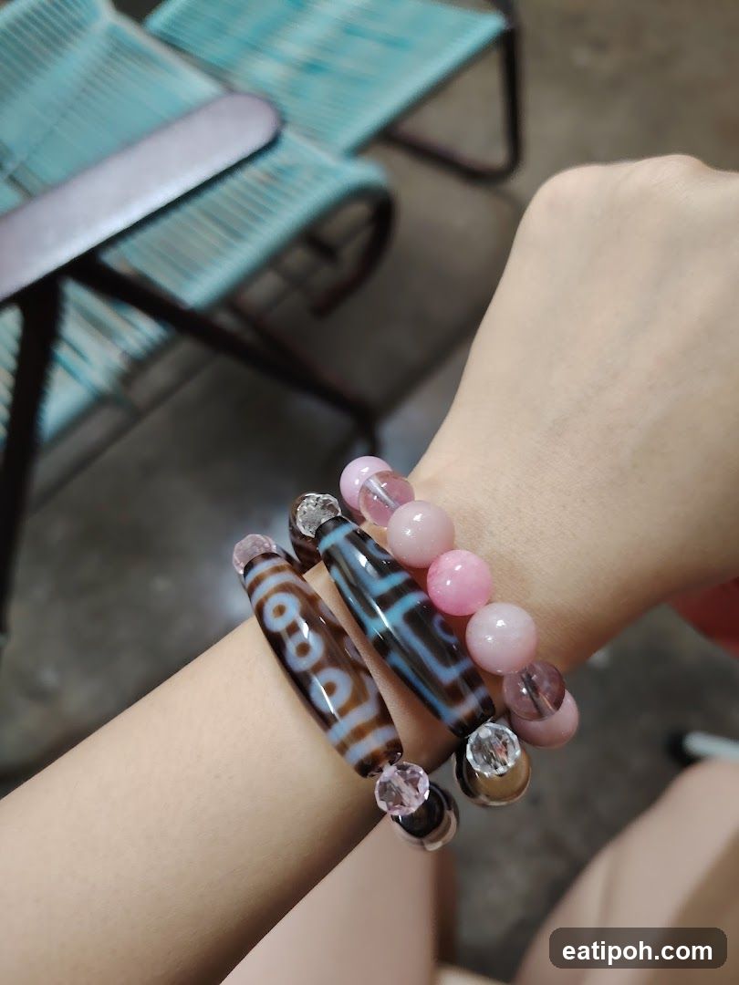 Hand wearing bracelets