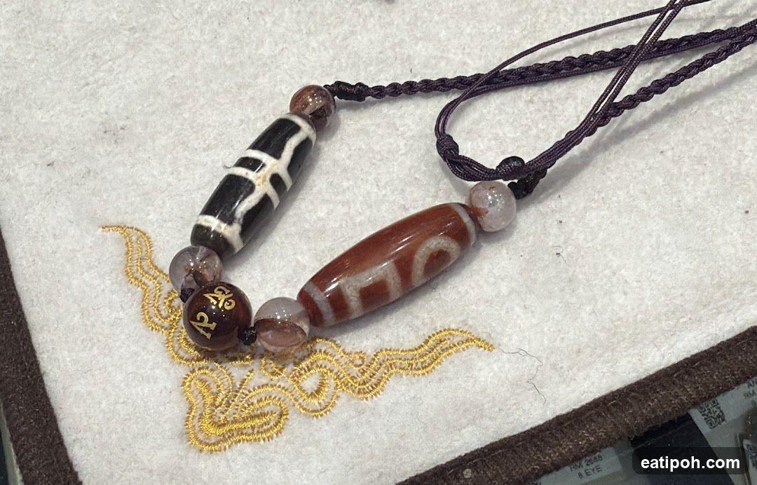 Bead Necklace on Embroidered Cloth