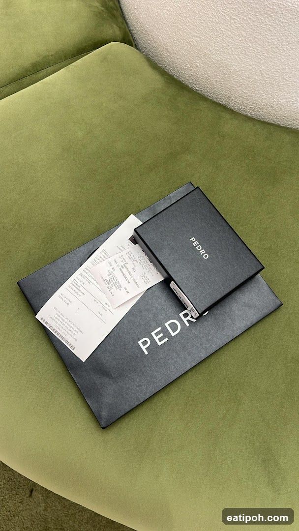 PEDRO Brand Items on Green Sofa