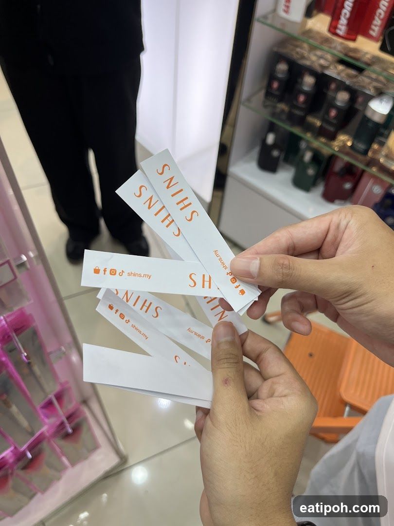 Hand holding promotional strips