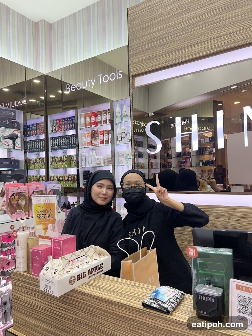 Two individuals in a beauty store