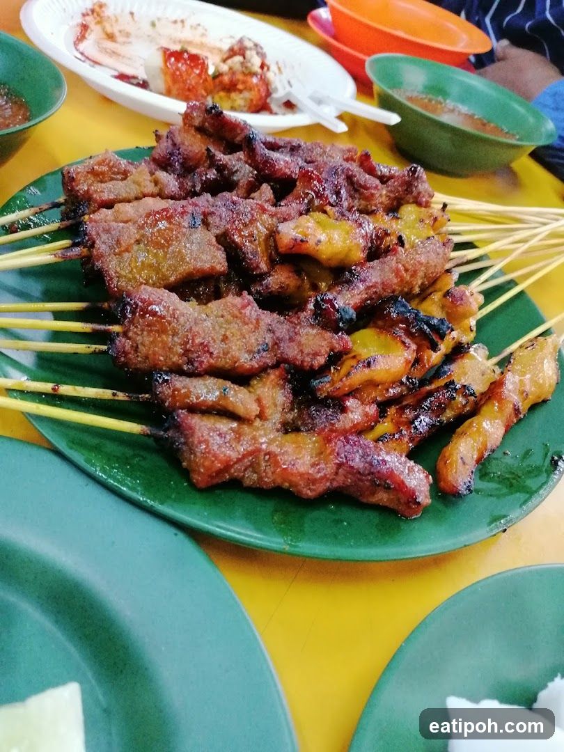Grilled Meat Skewers on Green Plate