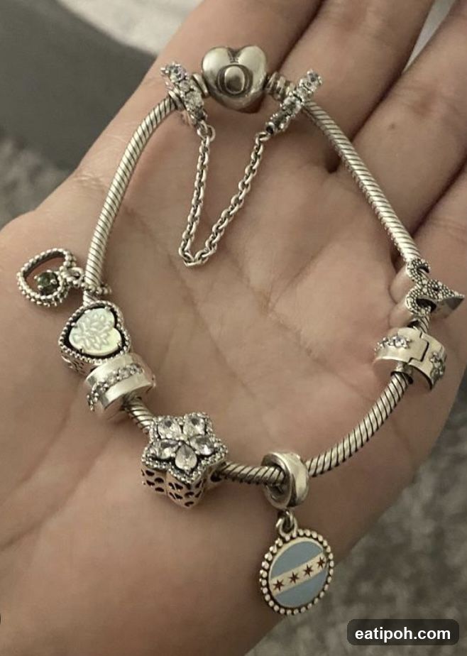 Hand Holding Charm Bracelet