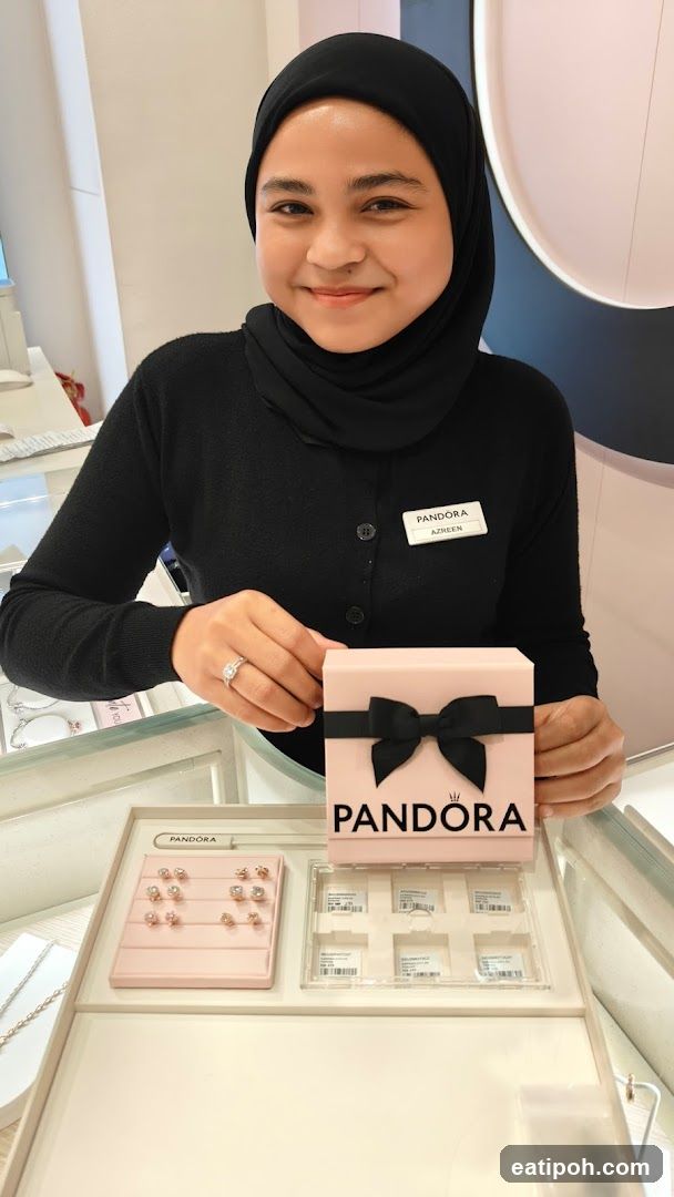 Pandora Staff Member Holding Product Box