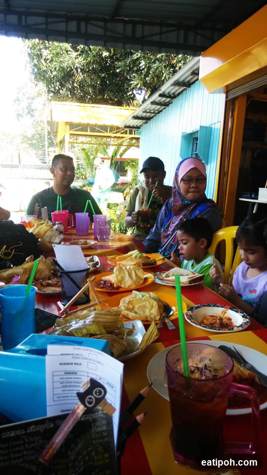 Group dining at outdoor restaurant